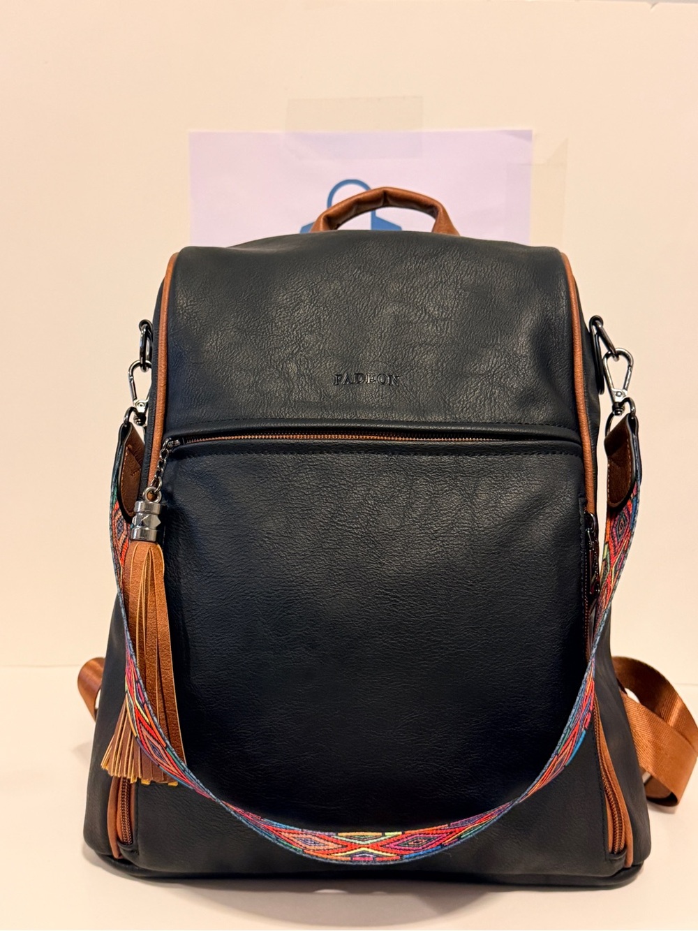 NWOT Fadeon Black Faux Leather Backpack with Colorful Woven Strap